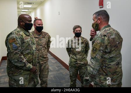 Col. Shannon Phares, 460th Medical Group commander, speaks to an ...