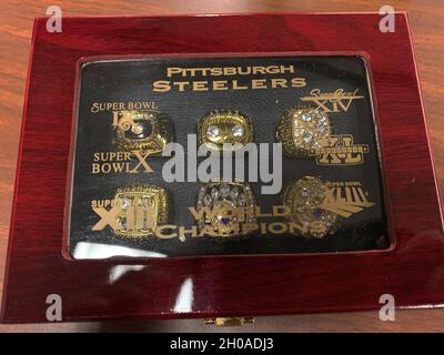 U.S. Customs and Border Protection officers in Pittsburgh seized a combined 60 Pittsburgh Steelers Super Bowl rings in eight different parcels that arrived from China and were destined to addresses in Allegheny County, Pa. The rings arrived as six-ring sets and represented each of the Steelers six Super Bowl championships.  The parcels arrived between December 9 and December 23, 2020. CBP officers suspected the rings to be counterfeit and detained them. CBP import specialist confirmed that the rings violated NFL and Steelers intellectual property rights trademarks, and officers completed the s Stock Photo