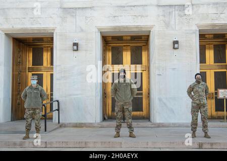 Virginia National Guard Soldiers from the 229 Military Police Company stand guard at their post near the John Adams Building, Library of Congress, on Jan. 9, 2021, Washington, D.C. National Guard Soldiers and Airmen from several states have traveled to the National Capital Region to provide support to federal and district authorities leading up to the 59th Presidential Inauguration. Stock Photo