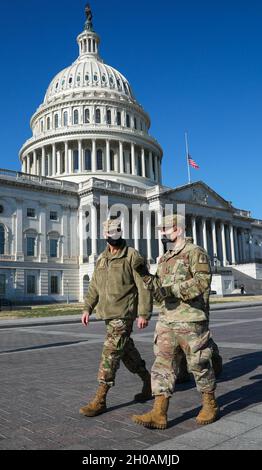 Lt. Gen. Marc H. Sasseville, Vice Chief, National Guard Bureau, visits National Guard servicemembers on duty near the U.S. Capitol, Jan. 12th, 2021. National Guard Soldiers and Airmen from several states have traveled to Washington, D.C., to provide support to federal and district authorities leading up to the 59th  Presidential Inauguration. The National Guard continues to support our local community and is proud, proven and prepared to assist local and federal partners in the District of Columbia. Stock Photo