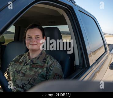 Senior Airman Kristina Grafton, 436th Operations Support Squadron airfield management operations supervisor, poses for a photo on the flight line at Dover Air Force Base, Delaware, Jan. 14, 2021. After the delayed launch of Total Force Training Records, Grafton built a digital training tracker, which was distributed to 133 other bases by the Air Force Flight Standards Agency as the airfield management career field’s interim standard for training documentation. Stock Photo