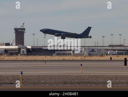 A KC-135R assigned to the Utah National Guard’s 151st Air Refueling Wing, departs Roland R. Wright Air National Guard Base in Salt Lake City, Utah, Jan. 15, 2021. The Soldiers aboard will augment local law enforcement and civil authorities in the nation’s capitol throughout the inauguration week. Stock Photo