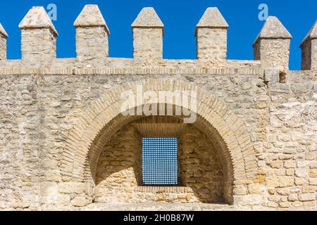 Embrasure on the medieval walls of Vejer de la Frontera. Cadiz, Andalusia, Spain Stock Photo