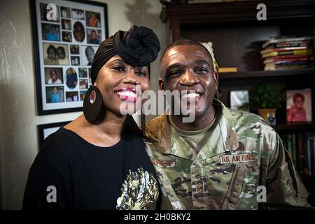 U.S. Air Force Chief Master Sgt. Wendell Snider (right), 502nd Air Base Wing and Joint Base San Antonio command chief, poses for a photo with his wife of 22 years, LaShae, after an interview Jan. 19, 2021, at JBSA-Randolph, Texas. The U.S. Air Force joins the millions of Americans celebrating Black History Month 2021 by honoring the history of African Americans in the military and considering ways to move forward in unity for the future. Stock Photo