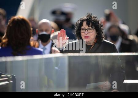 Supreme Court Justice Sonia Sotomayor swears in Vice President Kamala Harris into office during the 59th Presidential Inauguration ceremony in Washington, Jan. 20, 2021. President Joe Biden and Vice President Kamala Harris took the oath of office on the West Front of the U.S. Capitol. Stock Photo