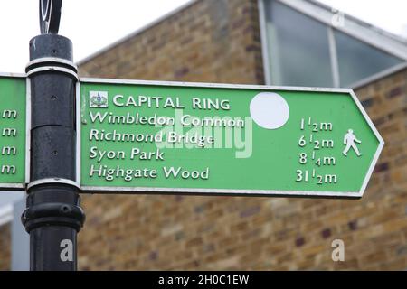 Wimbledon Park sign post for Capital Ring, Wimbledon Common, Richmond Bridge, Syon Park, Highgate wood, September 2021 Stock Photo