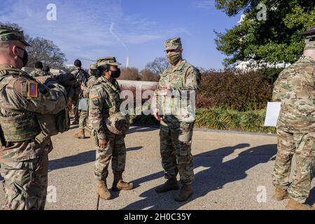 U.S. Army Brig. Gen. Janeen L. Birckhead (left), the Maryland National Guard’s assistant adjutant general for Army, speaks with U.S. Army Lt. Gen. James J. Mingus, the director of operations, Joint Staff at the Pentagon, in Washington D.C., Jan. 21, 2021. At least 25,000 National Guard men and women have been authorized to conduct security, communication and logistical missions in support of federal and District authorities leading up and through the 59th Presidential Inauguration.