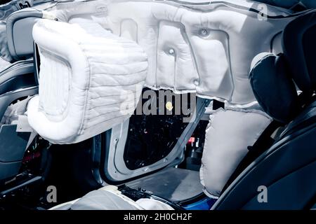 Airbags deployed in a modern Mercedes-Benz car in a safety demonstration at the IAA Mobility 2021 motor show in Munich, Germany - September 6, 2021. Stock Photo