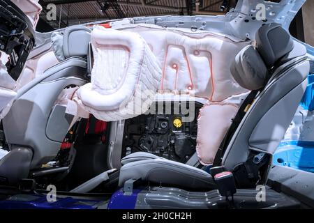 Airbags deployed in a modern Mercedes-Benz car in a safety demonstration at the IAA Mobility 2021 motor show in Munich, Germany - September 6, 2021. Stock Photo