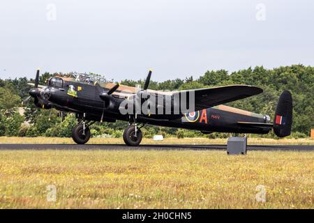 RAF Historical flight Avro Lancaster WW2 landing at Gilze-Rijen Airbase. The Netherlands - June 21, 2014 Stock Photo
