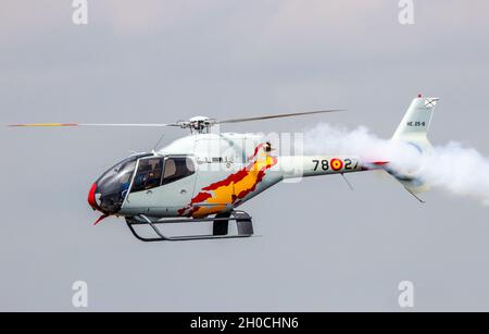 Eurocopter EC120 Colibri Helicopter of the Spanish Air Force team Patrulla Aspa performing at the Dutch Air Force Open Day on June 20, 2014 in Gilze R Stock Photo