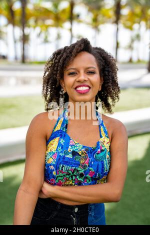 Attractive young woman posing in an outdoors scene Fort Lauderdale Beach FL Stock Photo