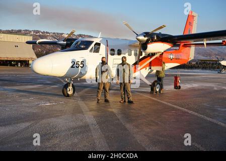 U.S. Naval Research Laboratory researchers Damien Josset, Ph.D., NRL oceanographer, Stephen Sova, NRL technician, and Stephanie Cayula, NRL physical scientist from the laboratory’s Ocean Sciences Division gather for a group photo Jan. 11 prior to conducting airborne lidar research in Homer, Alaska. Stock Photo