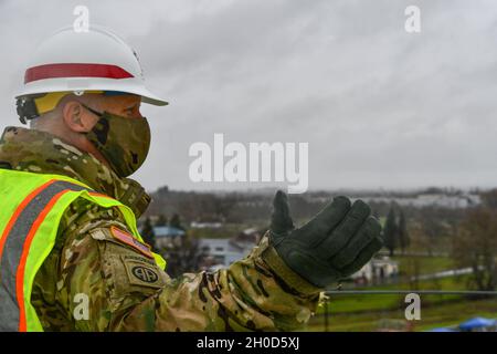 Brig. Gen. Paul Owen, commanding general of the U.S. Army Corps of Engineers South Pacific Division, overlooks Stockton, California from the roof of the unfinished Community Based Outpatient Clinic at the future VA Stockton medical complex Jan. 28, 2021. The USACE Sacramento District has been constructing the complex since November 2019, and recently began placing concrete on the above-ground floors of the clinic, which is the largest structure on the site. The overall project is set to be completed in 2024, with the clinic open for veterans by 2023. Stock Photo