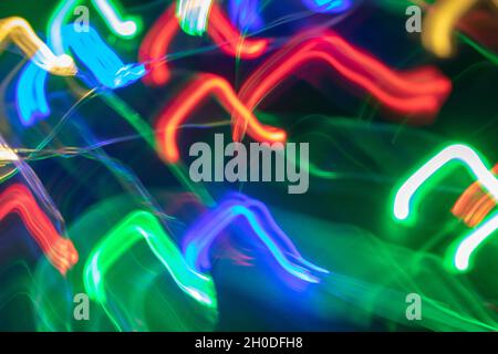 Abstract Light Trails in Vibrant Neon Colors – Red, Green, Blue, and Yellow Stock Photo