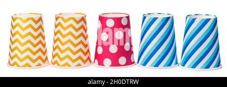 Paper disposable cups with colored pattern isolated on white background Stock Photo