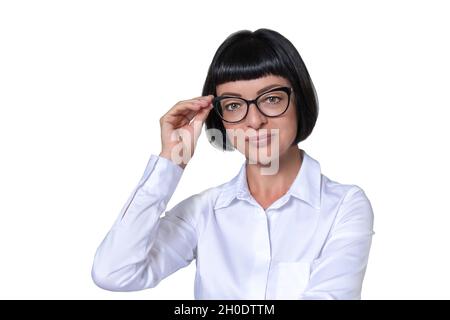 A middle-aged woman with dark hair wearing glasses and a white shirt. The isolated object on a white background Stock Photo