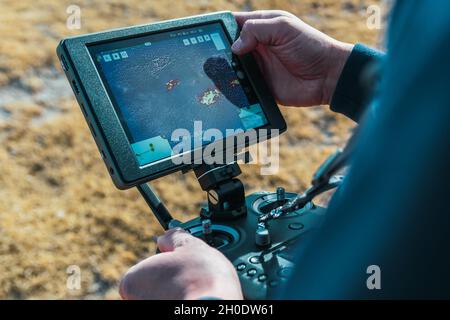 San Rafael, Argentina, June 28, 2021: firefighter flying drone with thermal camera Stock Photo
