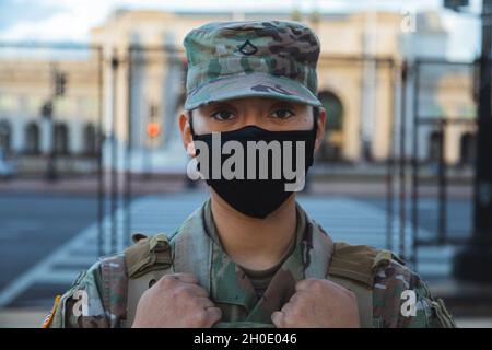 Pfc. Julie Rivera, assigned to the New Jersey Army National Guard’s 508th Military Police Company, provides sector security near the U.S. Capitol in Washington, D.C., Feb 5, 2021. The National Guard has been requested to continue supporting federal law enforcement agencies with security, communications, medical evacuation, logistics, and safety support to district, state, and federal agencies through mid-March. Stock Photo