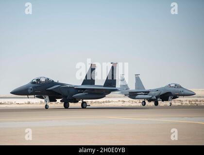 Two U.S. Air Force F-15E Strike Eagles assigned to the 332nd Air Expeditionary Wing taxi at Al Dhafra Air Base, United Arab Emirates, Feb. 5, 2021. The F-15E is a dual-role fighter designed to perform air-to-air and air-to-ground missions that has the capability to fight at low altitudes, day or night and in all-weather conditions.