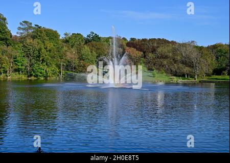 Landscape with a Beautiful Rainbow in a Fountain Stock Photo
