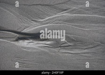 Swirls in the sand closeup Stock Photo