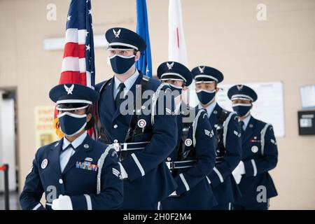 Members of the Travis Air Force Base Honor Guard present the colors during the 60th Air Mobility Wing 2020 Annual Awards ceremony Feb. 19, 2021, at Travis AFB, California. The ceremony recognized and highlighted Travis AFB’s top military and civilian personnel for the year. Stock Photo
