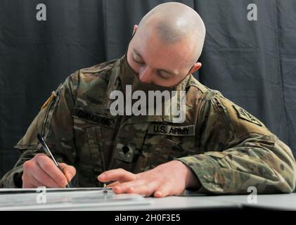 Spc. James Giancone of the Army Reserve’s 367th Military Police Company ...