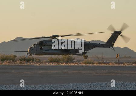 A U.S. Marine Corps CH-53E Super Stallion with Marine Medium Tiltrotor Squadron (VMM) 165 (Reinforced), 11th Marine Expeditionary Unit (MEU), taxis before takeoff during Realistic Urban Training exercise at Marine Corps Air Station Yuma, Arizona, Feb. 22, 2021. RUT is the final shore-based predeployment exercise for the 11th MEU and provides an opportunity to train and execute operations as a Marine Air-Ground Task Force in urban environments. Stock Photo