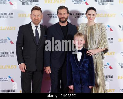 (left to right) Sir Kenneth Branagh, Jamie Dornan, Jude Hill and Caitriona Balfe arrive for the European premiere of 'Belfast', at the Royal Festival Hall in London during the BFI London Film Festival. Picture date: Tuesday October 12, 2021. Stock Photo