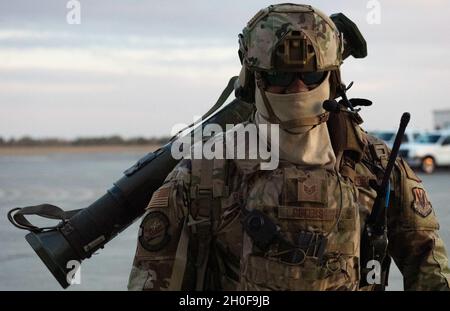 Personnel from the 23d Security Forces Squadron prepare to fire their ...