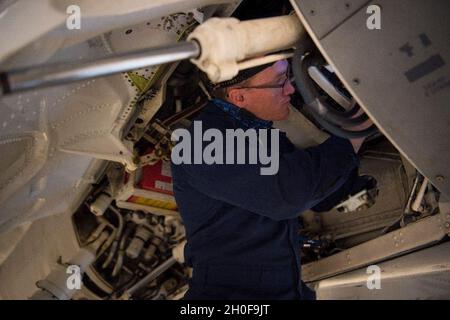 Staff Sgt. Bill Bohnas, 849th Aircraft Maintenance Squadron crew chief, tubes support brackets on hydraulic lines on an F-16 Viper, Feb. 23, 2021, on Holloman Air Force Base, New Mexico. The support brackets keep hydraulic lines from chaffing. Stock Photo