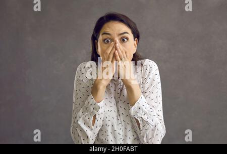 Sketch of scared girl with hand covers her mouth, Stock Illustration by  ©vvoennyy #267632918