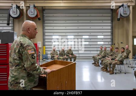 Maj. Gen. Benjamin Corell, Adjutant General of the Iowa Army National Guard, addresses Soldiers with Field Maintenance Shop No. 13 during a ceremony in which they received the Army Award for Maintenance Excellence at the Armed Forces Retention Center Complex in Cedar Rapids, Iowa, on Feb 24, 2021.   “This is representative of the shop, and we’re honored to receive [the AAME] for the hard work and dedication of the team,” said Master Sgt. Dean Schnoor, mechanical maintenance supervisor with FMS No. 13. “It’s an honor for us to be recognized at a level outside of the state.” Stock Photo