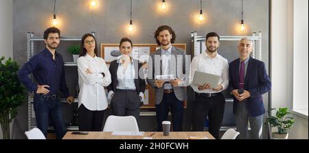 Multi-ethnic business people, group portrait of six different businessmen. Stock Photo