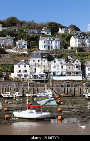 Looe Cornwall; boats in Looe harbour on the River Looe at low tide in the seaside town of Looe on the south coast, Cornwall UK Stock Photo