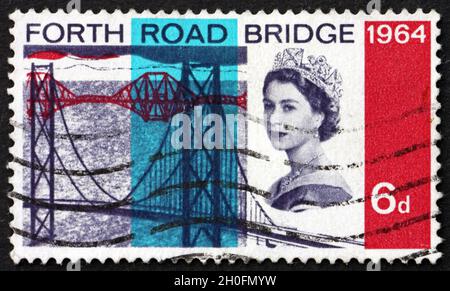 GREAT BRITAIN - CIRCA 1964: a stamp printed in the Great Britain shows Forth Road Bridge, Suspension Bridge in East Central Scotland, and Railroad Bri Stock Photo