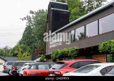 Woodinville, WA USA - circa August 2021: view of the Woodinville Whiskey Company on an overcast day. Stock Photo