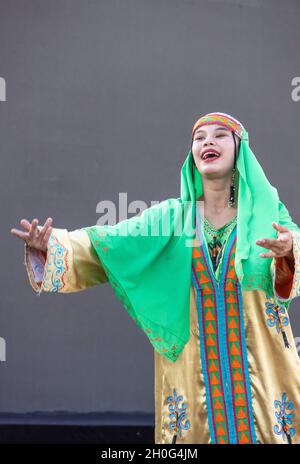 dancers performing traditional dances for delegates of international conference at a gala dinner, Tashkent, Uzbekistan Stock Photo