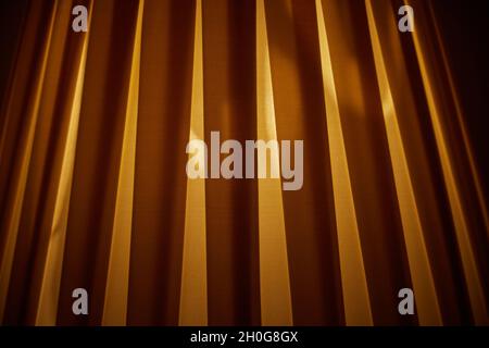 Close-up of a lampshade seen with the light on. Stock Photo