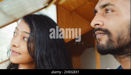 Headshot of young Indian people attentively watching something Stock Photo