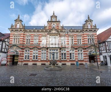 Pied Piper Statue in front of Old Post Office - Hamelin, Lower Saxony, Germany Stock Photo