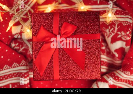 Red present box with bow. Gift for Christmas  Stock Photo