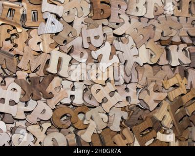 Top view of wooden letters on pie in different colors Stock Photo
