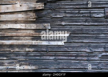 Old black and brown rustic dark wooden planks texture - wood timber background Stock Photo
