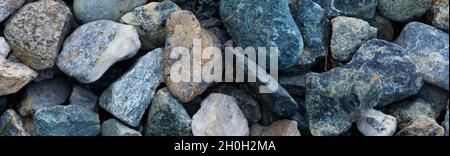 round stones on the ground in the garden Stock Photo