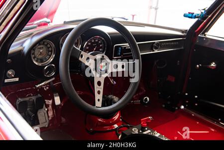 Italy, september 11 2021. Vallelunga classic. Vntage car cockpit steering wheel and dashboard with Alfa Romeo logo Stock Photo