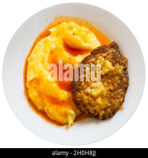 Russian dish - schnitzel with cheese and mashed potatoes. Slavic cuisine Stock Photo