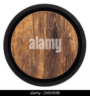 Two-color round wooden tea tray. Round wooden chopping board. Texture of old wooden planks. Stock Photo