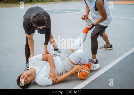 Basketball player, man with injury, ankle pain and sports trauma ...